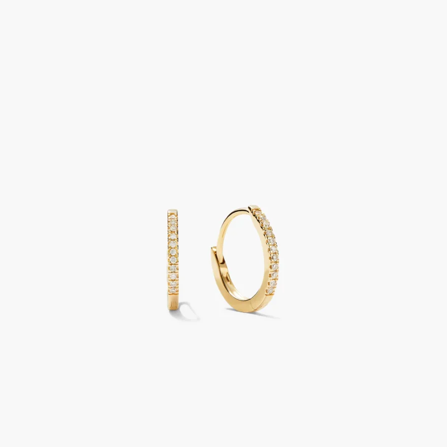 Mejuri Pavé Diamond Huggie Hoops in gold with pavé diamonds along outer edge, shown as a pair