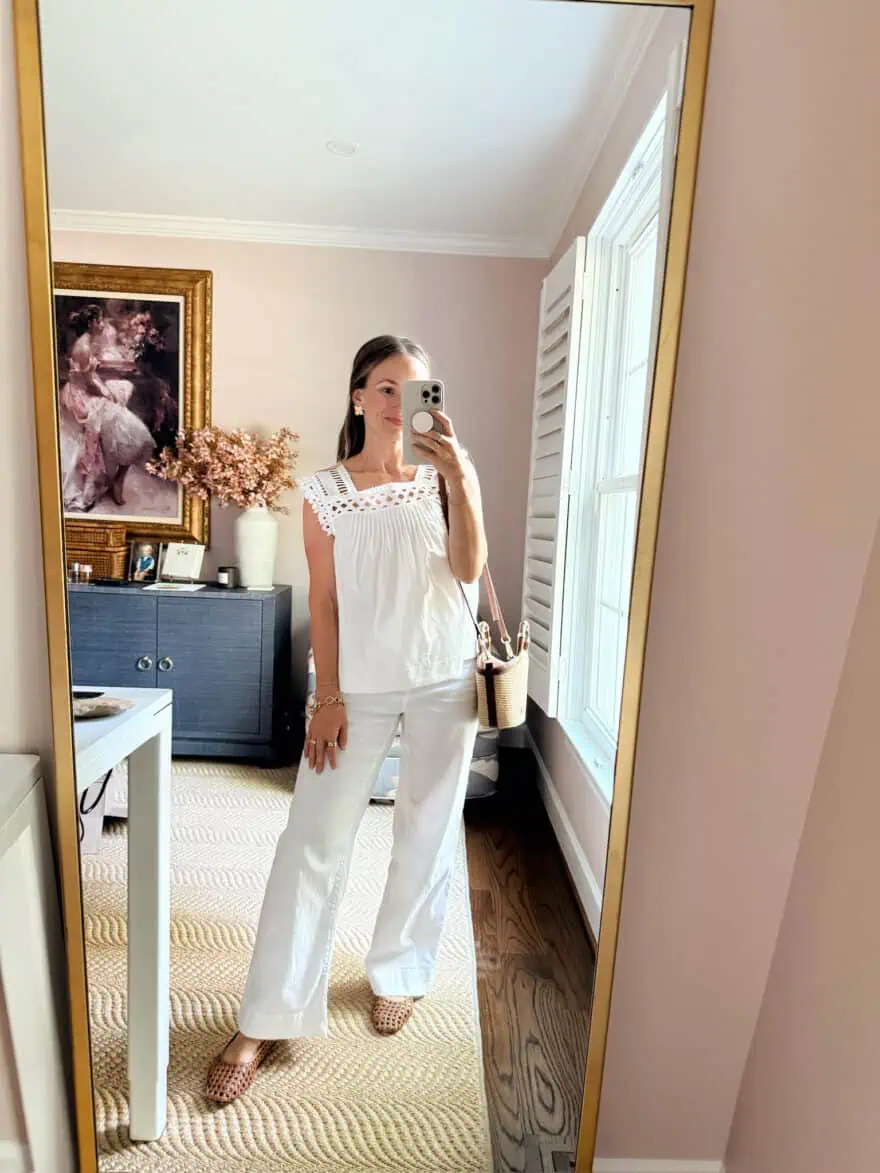 Woman wearing white linen pants with white top