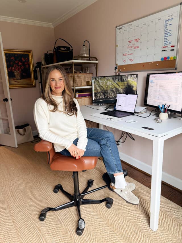 Woman sitting at desk in home office