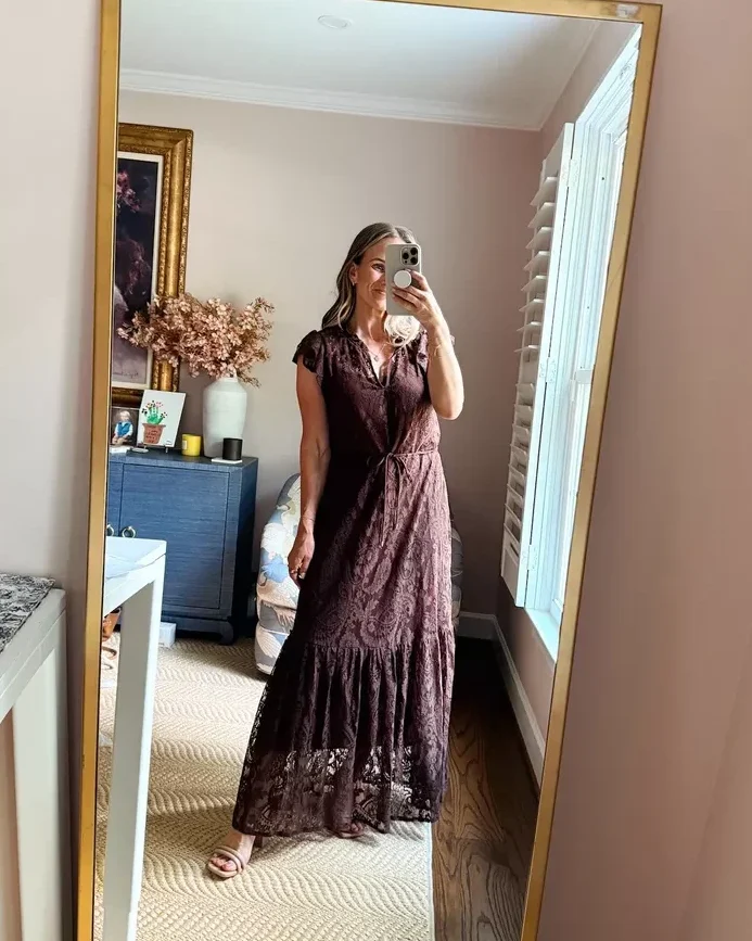 Woman wearing brown Steve Madden lace maxi dress