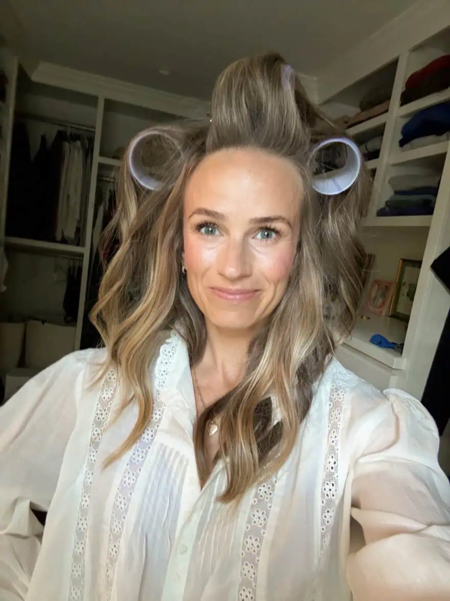 Woman wearing rollers in hair