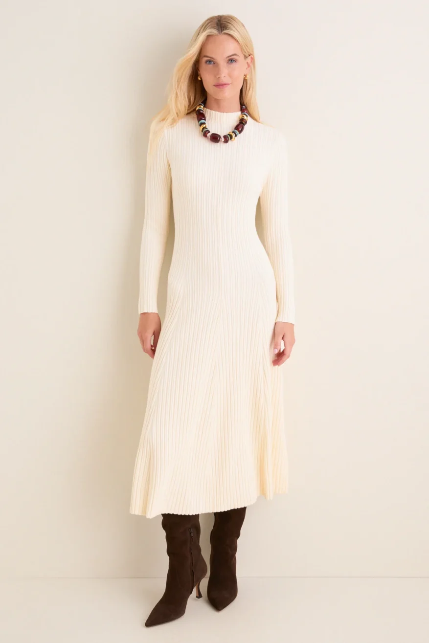 Tuckernuck cream ribbed midi dress worn by a model