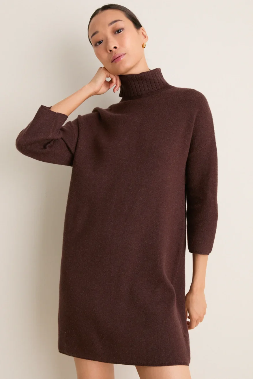 Tuckernuck Vivienne sweater dress in brown worn by a model