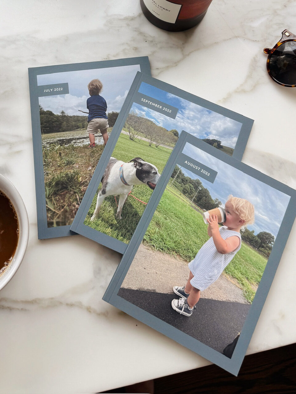 Three Chatbooks sitting on counter