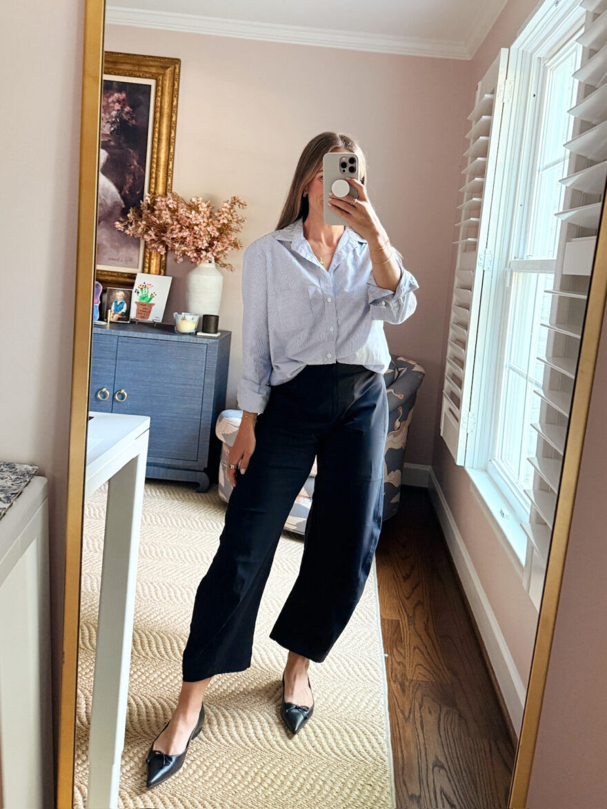TeriLyn Adams wearing a striped button-down shirt with black barrel-leg trouser pants and pointed flats