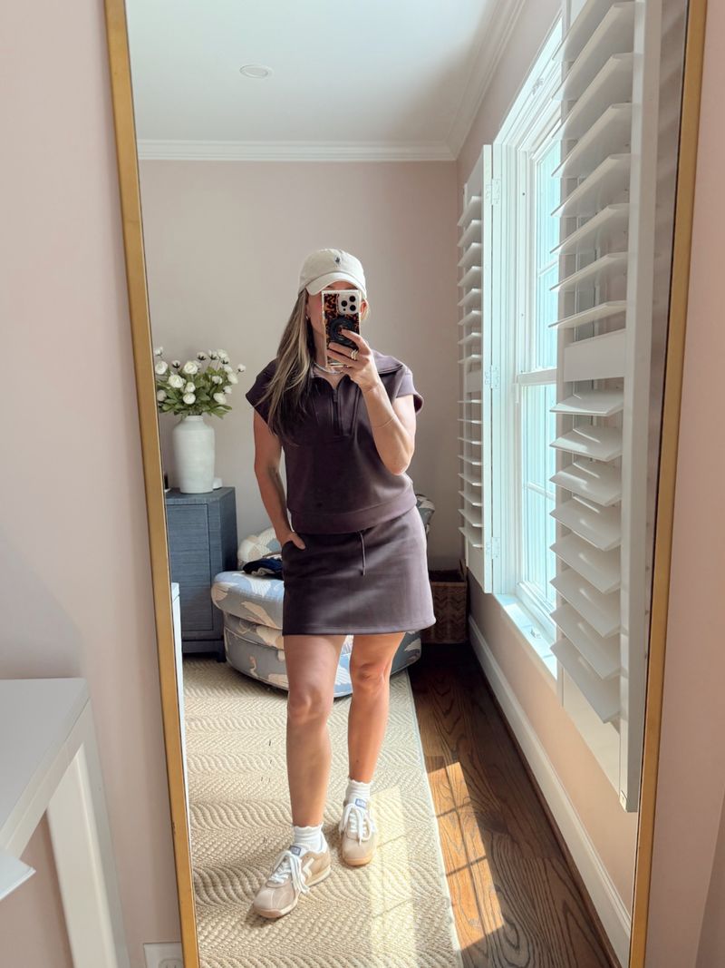 TeriLyn Adams wearing the Target Airy Sleek polo and skort with sneakers and a cap