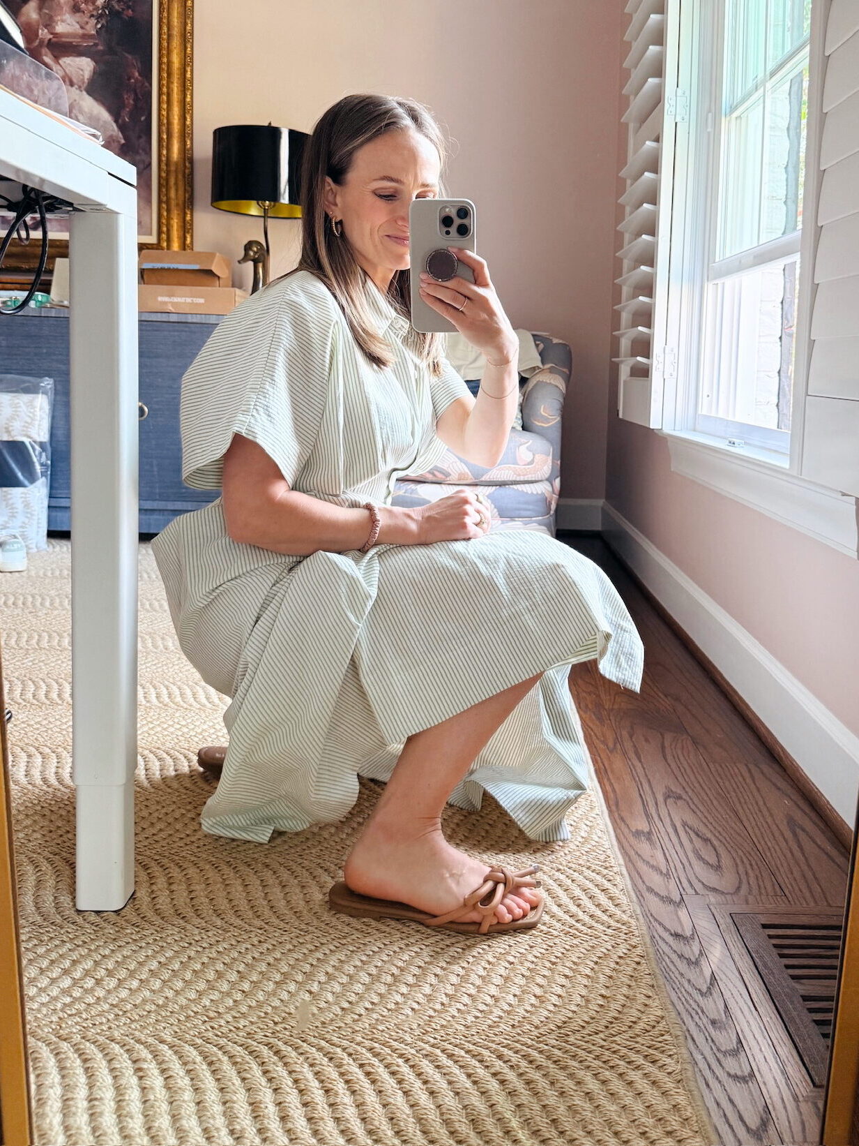 Woman showing Amazon dupes of Loeffler Randall sandals