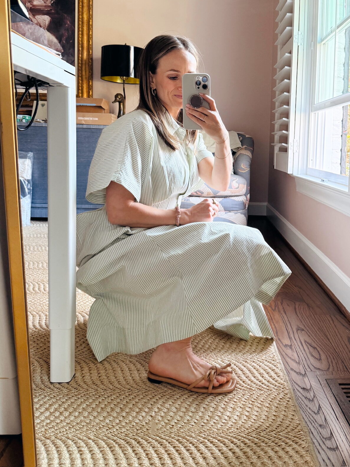 Woman showing Loeffler Randall sandals