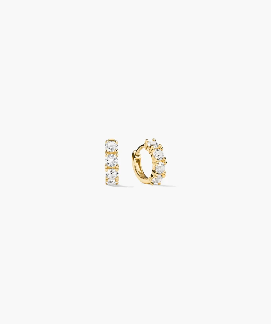 Mejuri gold huggie hoops with lab-grown white sapphires