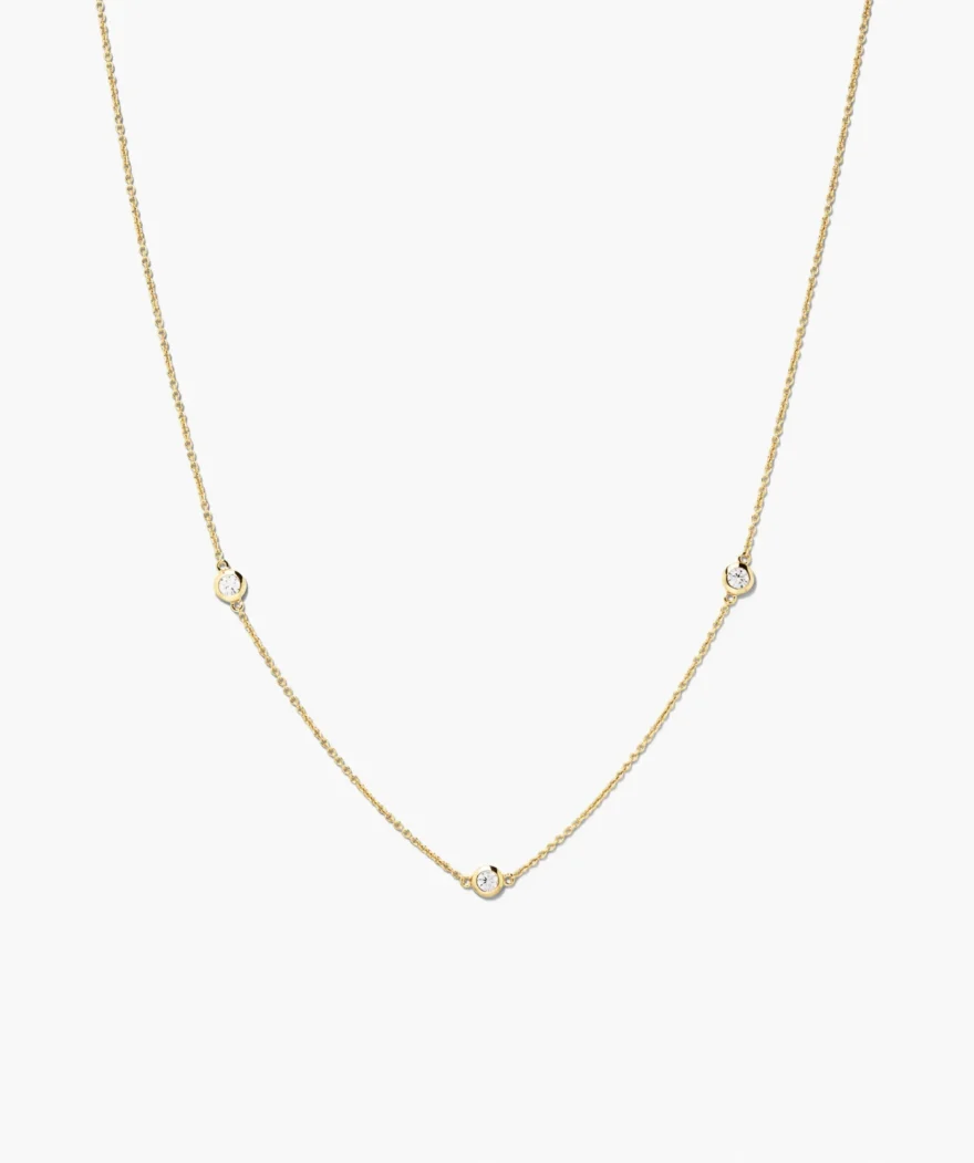 Mejuri gold Satellite necklace with three bezel diamonds