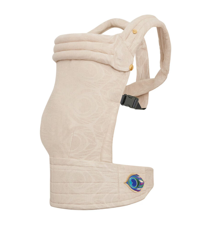 Artipoppe baby carrier in cream jacquard with embroidered eye emblem, side view.