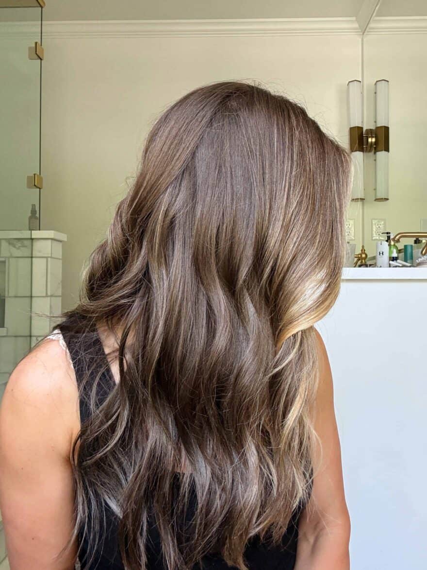 TeriLyn Adams finished curling her hair with nice beach waves