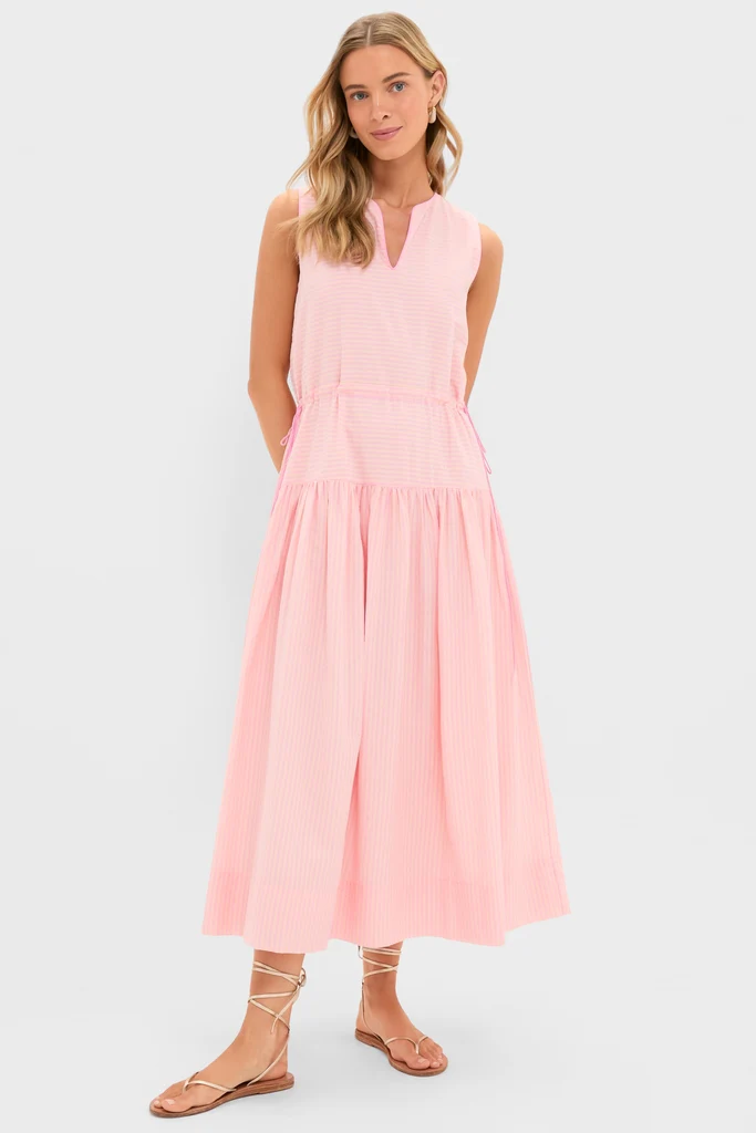 woman wearing pink peach maxi dress with strappy sandals