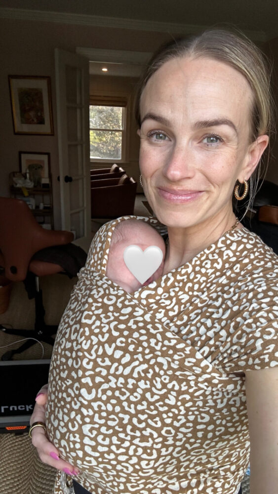 TeriLyn Adams wearing Solly Baby Wrap with Charles