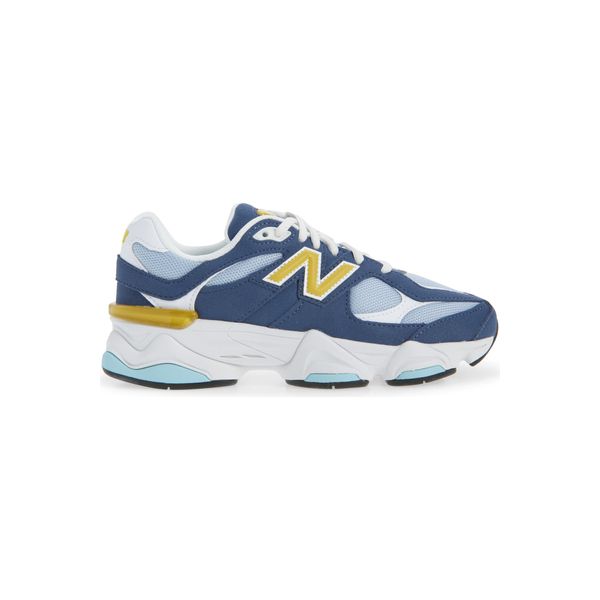 New Balance 9060 sneaker in navy with gold accents, kids, product shot