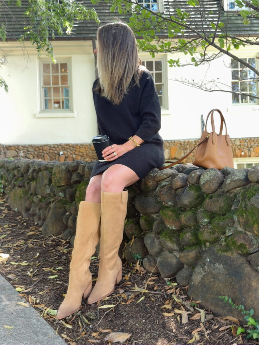 TeriLyn Adams wearing Sam Edelman Wren knee-high boots with a sweater dress and tan tote bag