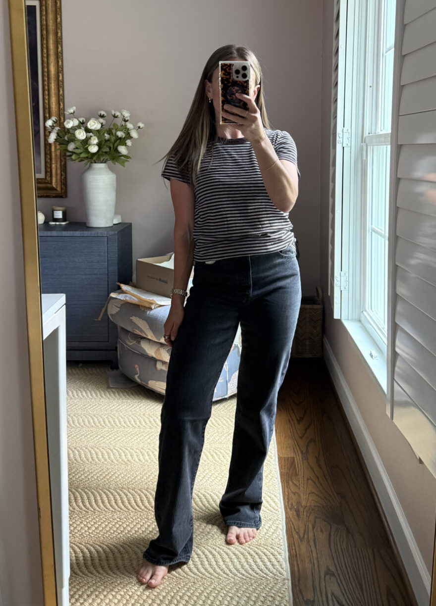 TeriLyn Adams wearing Levi's Ribcage high waist straight leg jeans in black with a striped tee