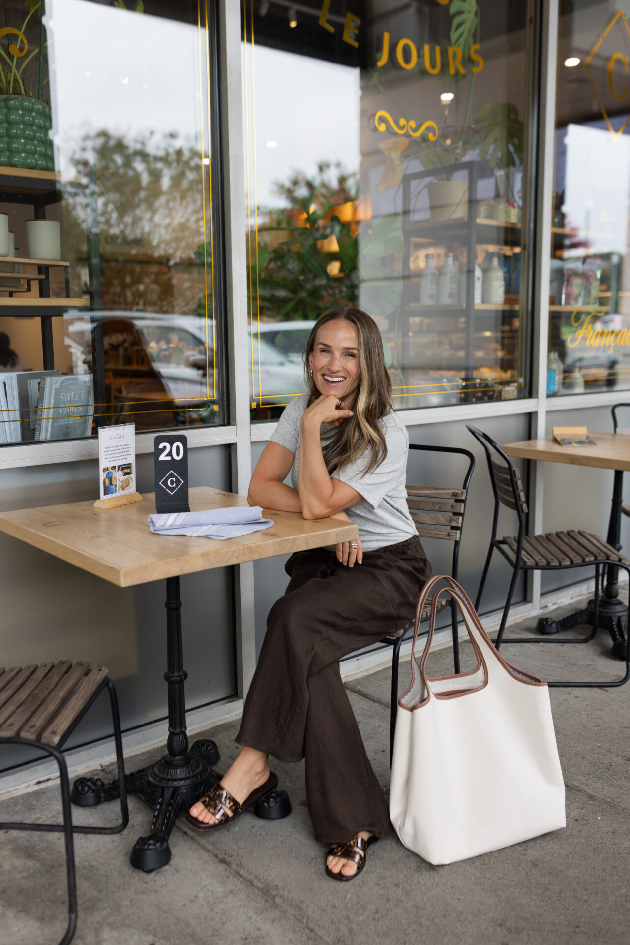 TeriLyn Adams with the Cuyana Sytstem Beach Tote.