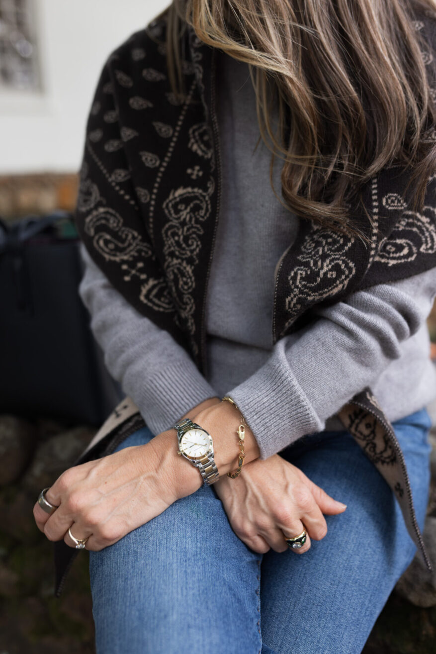 TeriLyn Adams wearing the Wild Rag scarf with gray sweater.