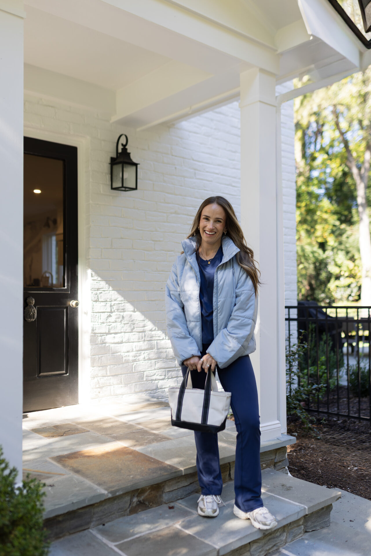TeriLyn Adams wearing Vuori Halo wide leg pants with canyon insulated sporty coat.